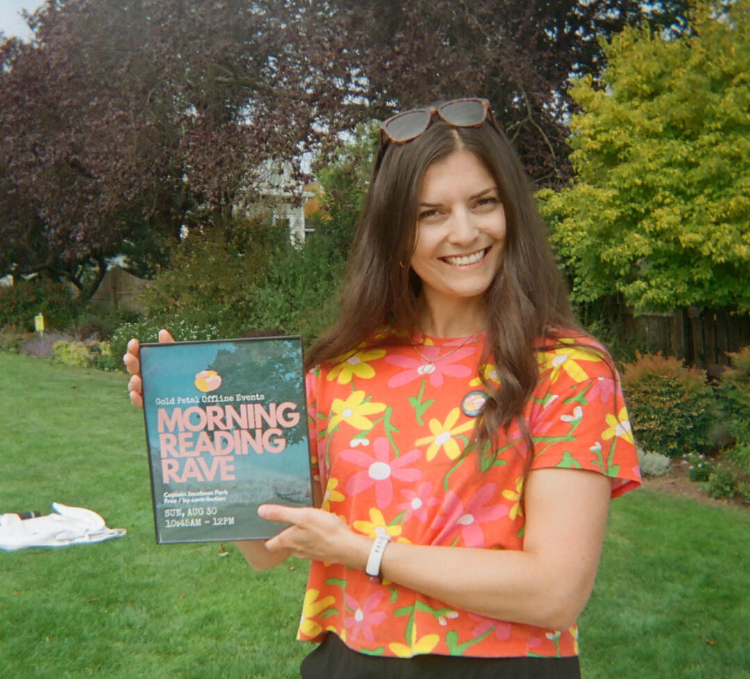 Diana - Offline Reading Rave A photo of Diana holding a poster.